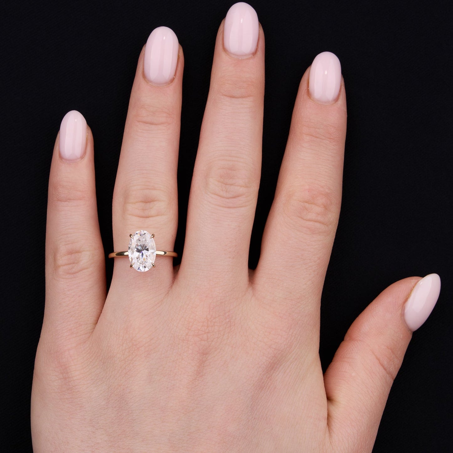 The Seraphine Ring - East-West Oval Solitaire